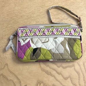 VERA BRADLEY. Wristlet wallet with 4 card slots and inside zippered compartment.